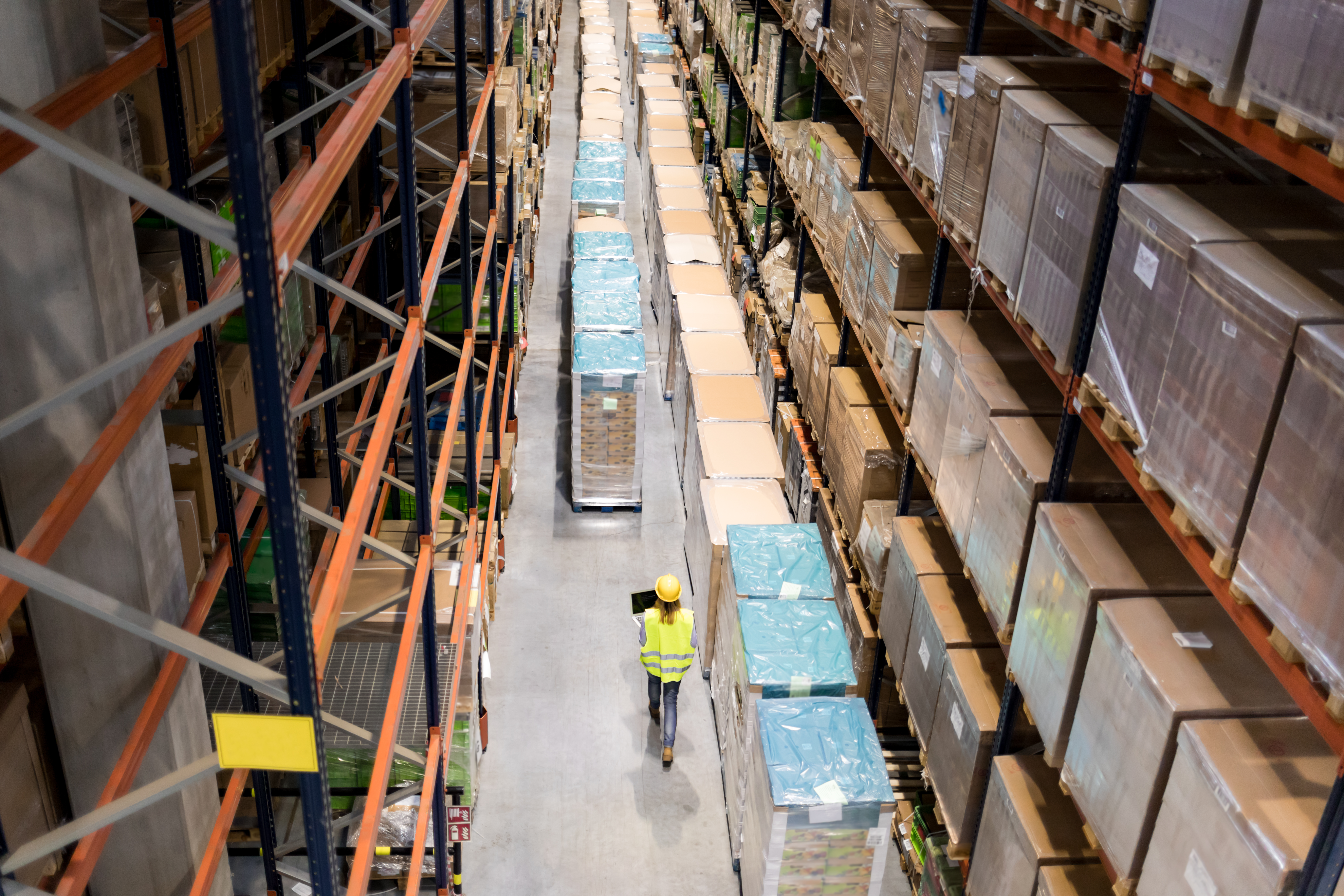 Warehouse team checking live inventory on a laptop