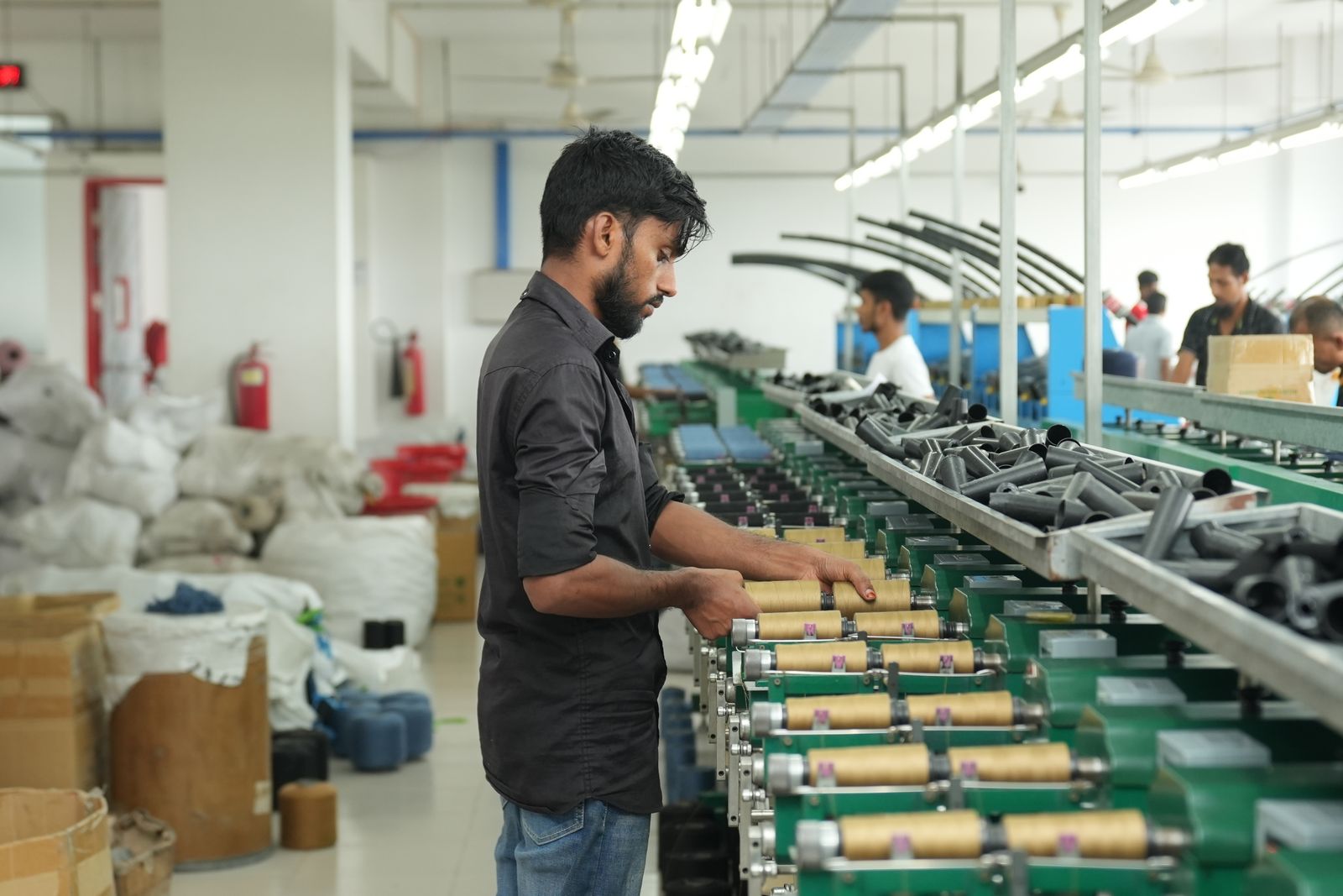 Operator working on a factory assembly line